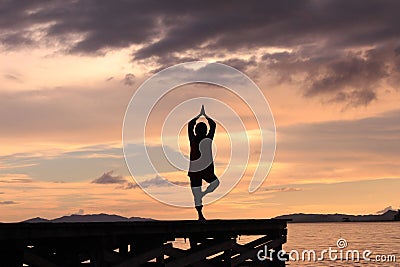 The beauty of the sunset on the beach of Raja Ampat Indonesia, and the silhouettes of tourists' expressions. Stock Photo