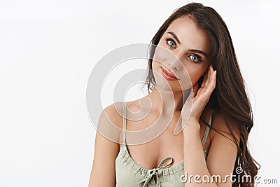 Beauty and tenderness. Charming, alluring and romantic caucasian female with perfect makeup, dressed for valentines date Stock Photo