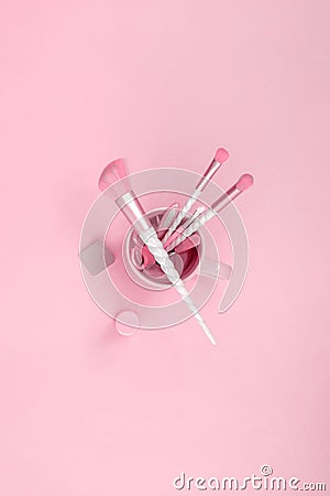 Beauty unicorn makeup brushes with candy pink accessories Stock Photo