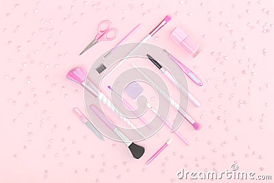 Beauty unicorn makeup brushes on silver pink Stock Photo