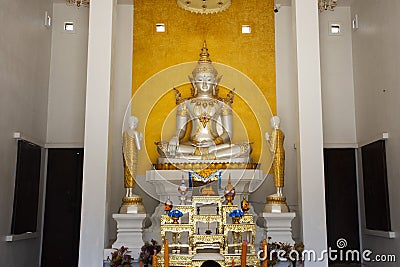 Beauty white ancient buddha in antique ubosot of Wat Pho Khuan Maphrao temple for thai people travelers travel visit respect Stock Photo