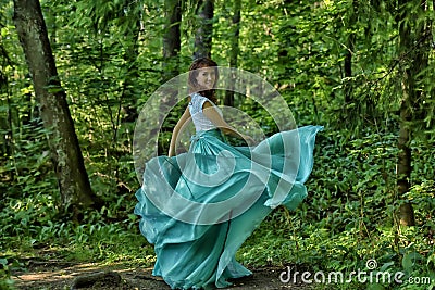 Beauty woman with dress flying Stock Photo