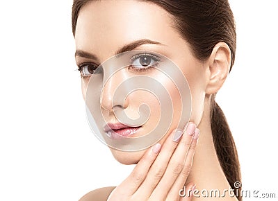 Beauty Woman face Portrait. Beautiful model Girl with Perfect Fresh Clean Skin. Stock Photo