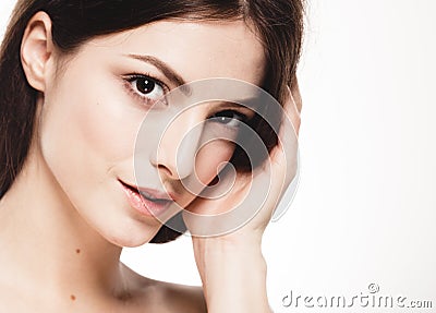 Beauty Woman face Portrait. Beautiful model Girl with Perfect Fresh Clean Skin. Stock Photo