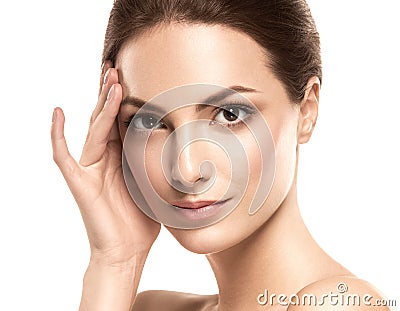 Beauty Woman face Portrait. Beautiful model Girl with Perfect Fresh Clean Skin. Stock Photo
