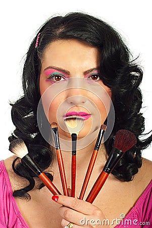 Beauty woman holding brushes set Stock Photo