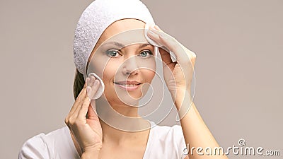 Beauty woman natural make up. Remove mascara. Cotton pad Stock Photo