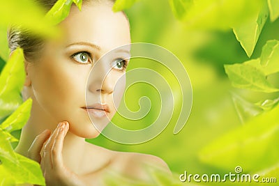 Beauty woman and a natural skin care in green Stock Photo