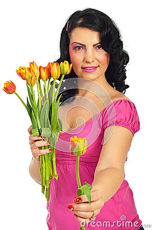 Beauty woman offering a fresh tulip Stock Photo