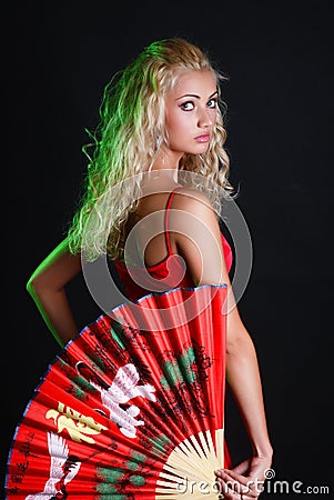 Beauty woman and red candy Stock Photo
