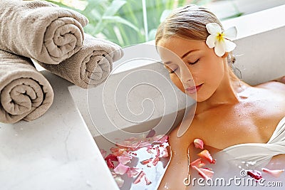 Beauty Woman Spa Body Care Treatment. Flower Bath Tub. SkinCare Stock Photo