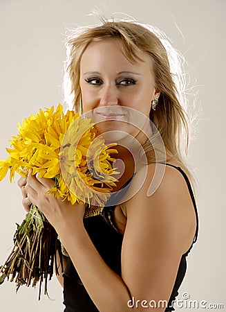 Beauty with yellow flowers Stock Photo