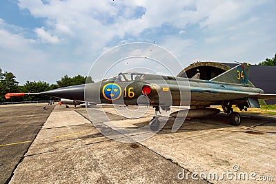 BEAUVECHAIN, BELGIUM - JUL 3, 2010: Former Swedish Air Force Saab 35 Draken fighter jet aircraft on the tarmac of Beauvechain Editorial Stock Photo