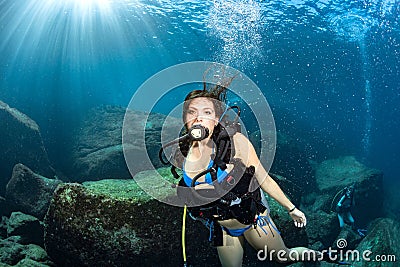 Beaytiful Latina Mexican Diver underwater Stock Photo