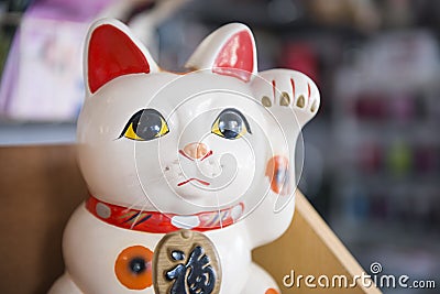 Beckoning cat lucky doll from Japan Stock Photo
