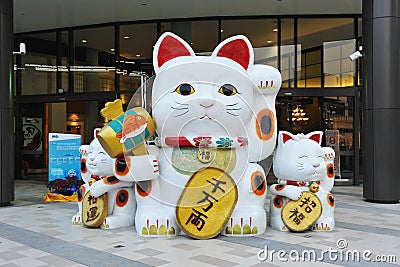 Beckoning Cat Sculpture Editorial Stock Photo