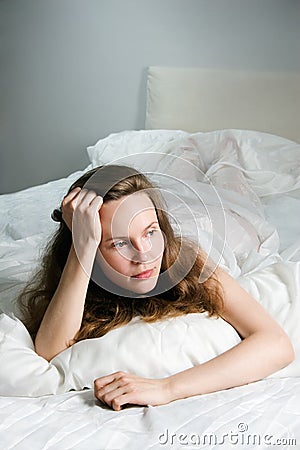 Bed contemplation Stock Photo