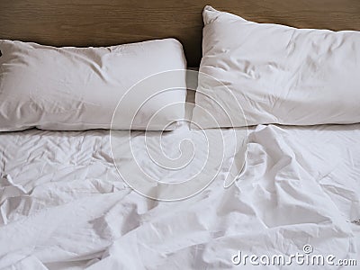 Bed Mattress and pillows unmade Bedroom Stock Photo