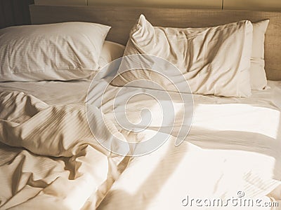 Bed sheet mattress Pillows messed up Bedroom interior Stock Photo