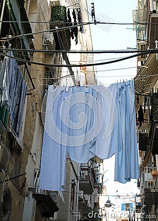 bedclothes hanging in Naples Stock Photo