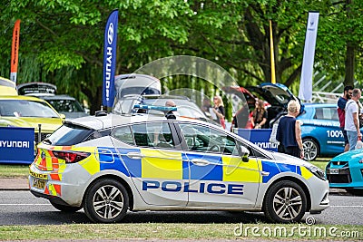 Bedford, Bedfordshire, UK June 2 2019.Police Vehicle responds to an emergency on a city center street during special event Editorial Stock Photo