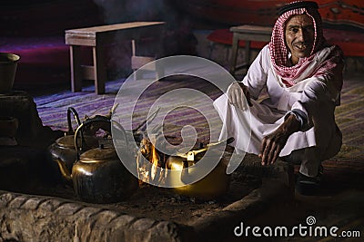 Bedouin cooking tea in a tent Editorial Stock Photo