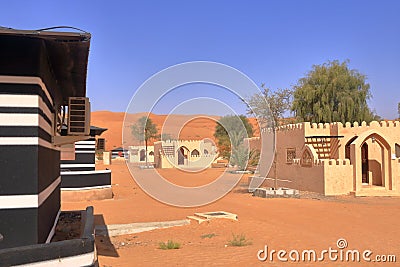 Bedouin style camping beside a huge sand dune at the Wahiba Sands desert, Oman Stock Photo