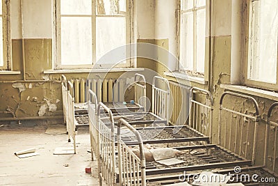 Bedroom of abandoned kindergarten in Chernobyl, Exclusion Zone, Stock Photo