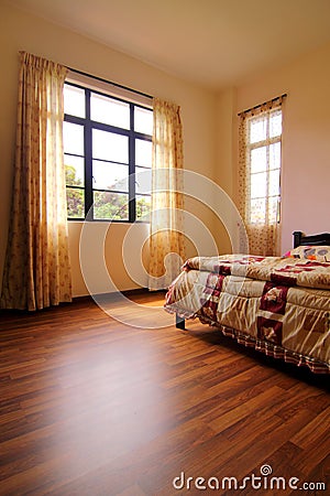 Bedroom with Hardwood Flooring Stock Photo