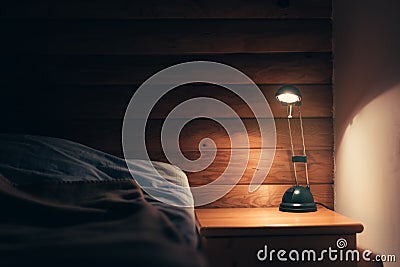 Bedroom lamp on a night table Stock Photo