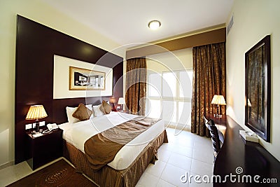 Bedroom with opened curtain big double bed Stock Photo