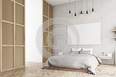 Bedroom with poster and a window in a beige wall Stock Photo