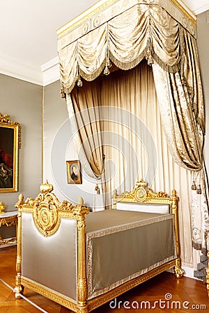 Bedroom with royal canopy bed Stock Photo