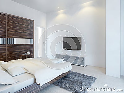 Bedroom with TV and a media console. Stock Photo