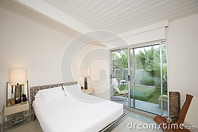 Bedroom With View Of Porch Stock Photo