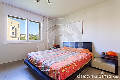 Bedroom with window with blue sky Stock Photo