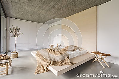 Bedroom with wooden ceiling Stock Photo