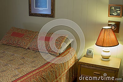 Bedside table with lamp in hotel resort Stock Photo