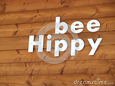 Bee Hippy Sign that a suburban community embraces. Stock Photo