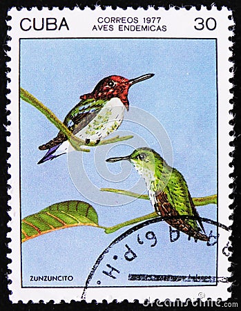 Bee hummingbird, zunzuncito or Helena hummingbird Mellisuga helenae, stamp is from the series, circa 1977 Editorial Stock Photo