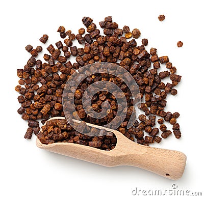 Bee Pollen Propolis In Wooden Scoop Isolated Stock Photo