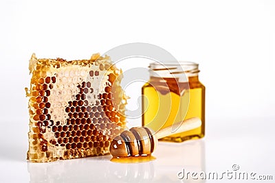 A bee sits on a honeycomb - a jar of honey white background Stock Photo