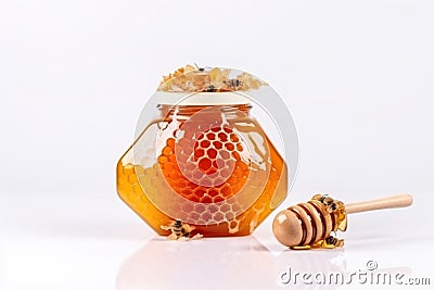 A bee sits on a honeycomb - a jar of honey white background Stock Photo