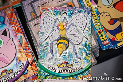 Beedrill, Pokemon playing cards at the flea market. Editorial Stock Photo