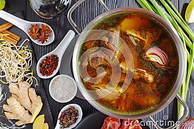 Beef bone broth in a pan Stock Photo