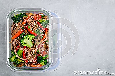 Beef broccoli noodles stir fry meal prep lunch box container Stock Photo