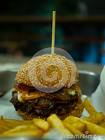 Beef grill bacon cheese with salad hamberger and French fries Stock Photo