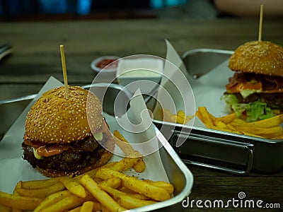 Beef grill bacon cheese with salad hamberger and French fries Stock Photo