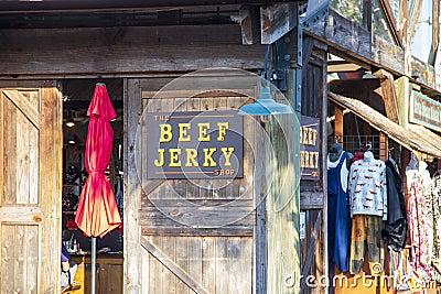 The Beef Jerky Shop with clothes hanging in a shop at The River Street Market Place on River Street in Savannah Georgia Editorial Stock Photo