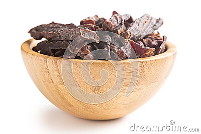 Beef jerky in wooden bowl Stock Photo